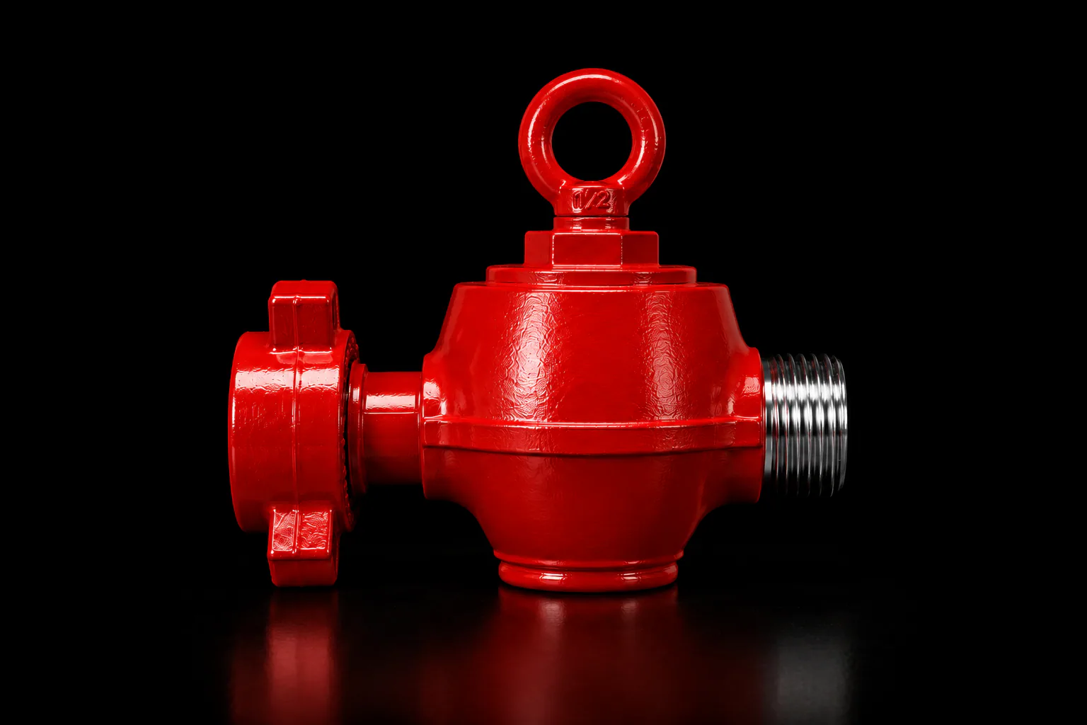 Red swing check valve on a black background