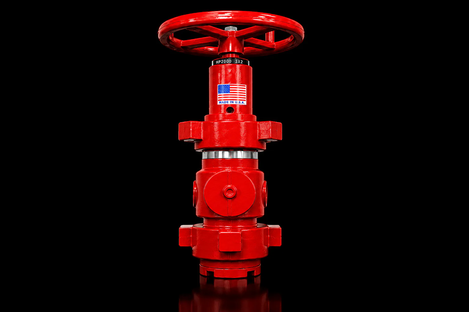 Red target choke valve on a black background