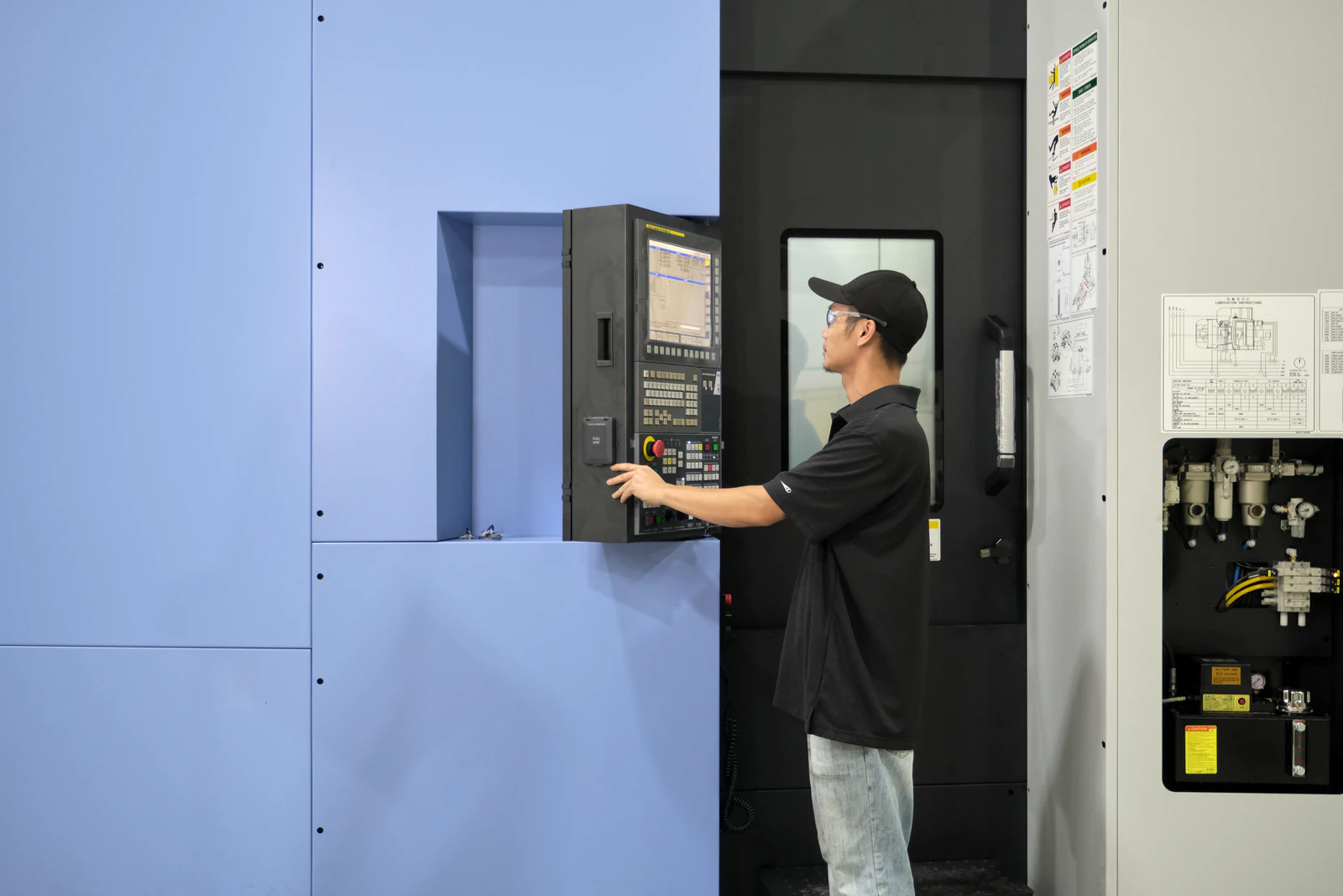 Cactus Flow Control machine operator working at CNC equipment